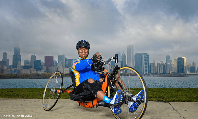 Donna Pratt posing with her bike.
